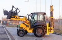 екскаватор навантажувач new holland b110c